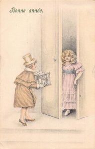 L150 New Year Greetings 1908 children puppy gift vintage postcard