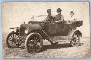 c1910's Men Riding In Ford Model T Hanna Alberta Canada RPPC Photo Postcard
