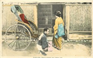 c1907 Hand-Colored Litho Postcard O-Koto-san Takes a Ricksha, Man Kneels, Japan