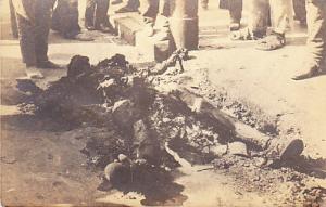 Charred Corpse on City Street Real Photo