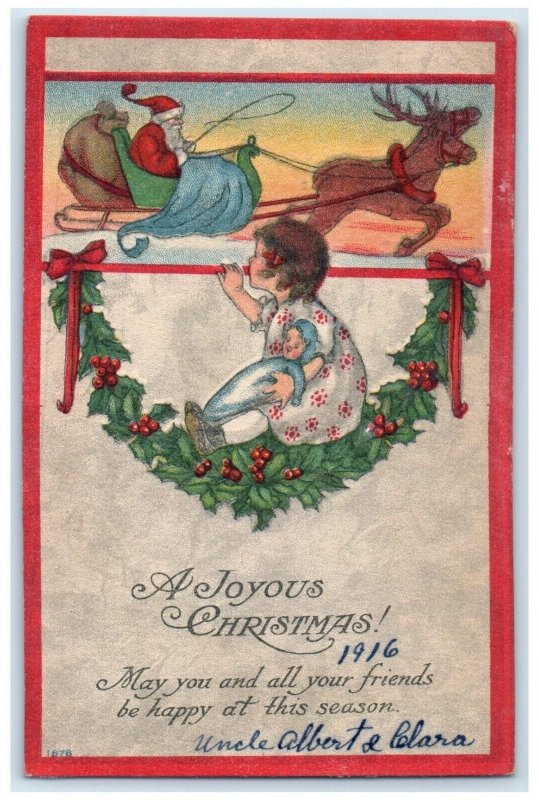 1916 Christmas Little Girl With Toy Santa Claus Sleigh Holly Berries Postcard