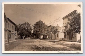 J87/ Savannah Ohio RPPC Postcard c1910 Main Street Stores Homes  1312