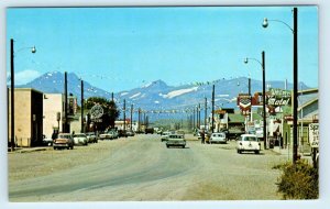 BROWNING, MT  Street Scene CHEVRON GAS  c1950s, 60s Cars Glacier County Postcard