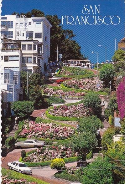 California San Francisco A Cable Car Passes Above Lombard Street