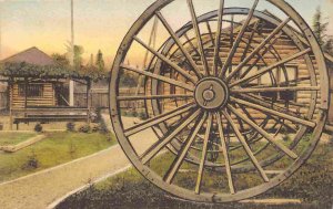 Logging Wheels Fort Algonquin US 31 St Ignace Michigan hand colored postcard