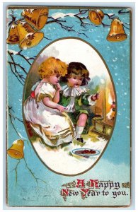 1908 New Year Children Eating Ringing Bells Embossed Waren County PA Postcard 