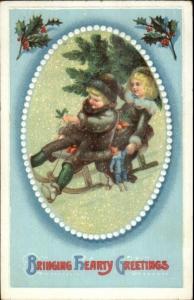 Christmas - Children on Sled w/ Tree Series 1155 c1910 Postcard