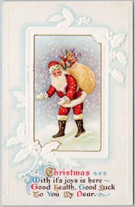 Ullman Christmas Santa Claus in Snow Toys Gifts Xmas Embossed 1914 Postcard H70