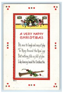 1914 Happy Christmas Childrens Playing Christmas Tree Holly Embossed Postcard