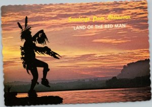 postcard Greetings from Oklahoma Land of the Red Man  Silhouette at Sunset