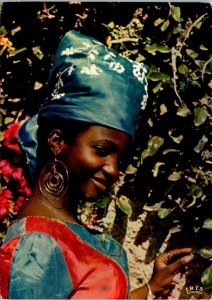 VINTAGE CONTINENTAL SIZE POSTCARD A GACIOUS SMILE FROM A HAITIAN BEAUTY 1977