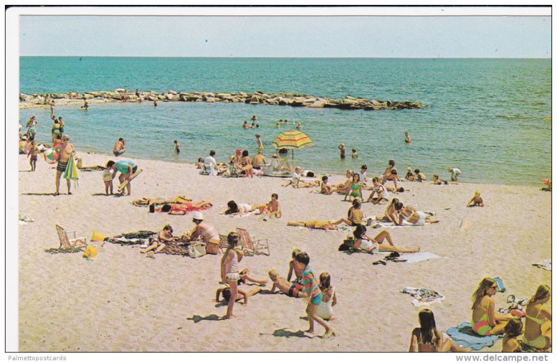 Beach Bathers on Beach near Rock Jetty, Cape Cod, Massachusetts