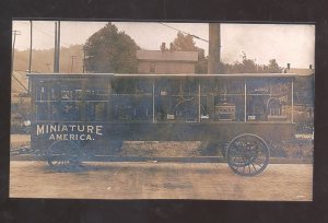 REAL PHOTO MINIATURE AMERICA AMUSEMENT PARK WAGON ADVERTISING POSTCARD