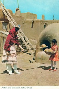 VINTAGE CONTINENTAL SIZE POSTCARD MOTHER AND DAUGHTER BAKING BREAD ADOBE MUD