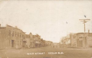 J30/ Rolla North Dakota RPPC Postcard c1910 Main Street Stores 137