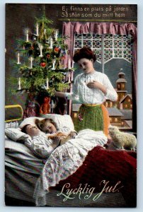 Christmas Postcard Mother Watching Children Sleeping With Christmas Tree c1910's