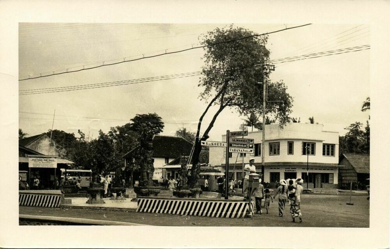 indonesia, BALI DENPASAR, Street Scene with Signpost (1954) RPPC Postcard