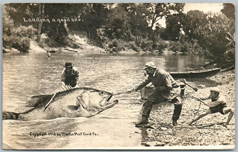 EXAGGERATED FISHING ANTIQUE REAL PHOTO POSTCARD RPPC LANDING A GOOD ONE