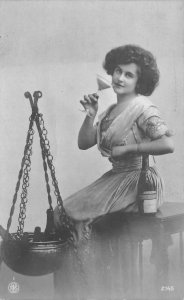 RPPC BEAUTIFUL WOMAN WINE CHAMPAGNE BOTTLE FRANCE REAL PHOTO POSTCARD (1912)