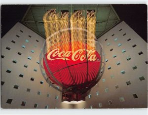 Postcard The 18-ton revolving neon sign, The World Of Coca-Cola, Atlanta, GA
