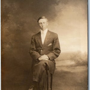 c1910s Stoic Young Man Portrait RPPC Sitting in a Chair Classy Fashion Suit A213