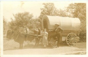 Postcard RPPC 1930s Covered wagon cowboy Bison people TR24-3402