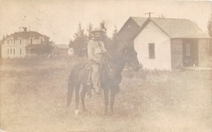 J21/ Carrington North Dakota RPPC Postcard c1910 Horse Cowboy Homes 209
