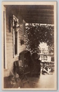 RPPC Typical Front Porch Sleeping Dog Hung Hat Altgeld Street c1915 Postcard A26