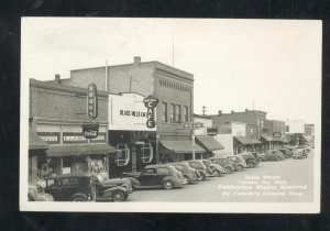 RPPC CUSTER SOUTH DAKOTA DOWNTOWN STREET SCENE OLD CARS REAL PHOTO POSTCARD