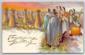 Thanksgiving Greetings Pilgrim Women in Field of Wheat & Pumpkin Postcard J26