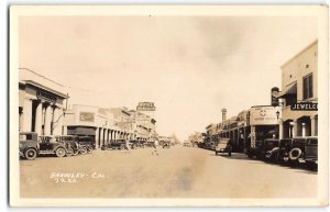 RPPC BRAWLEY, CA Street Scene White Cross Drugs Hotel Dunlack 1920s Postcard