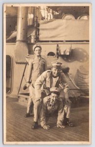 RPPC~Navy or Merchant Sailors in Horseplay~Pipe Smoker~Leapfrog~Steamship Funnel