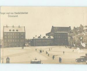 old rppc OLD CAR BESIDE BUILDINGS Ostersund - Jamtland Sweden HM1731