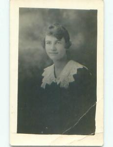 Bent Pre-1930 rppc PRETTY GIRL WITH SHORT HAIR o2105