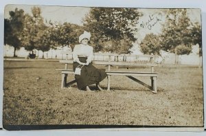 RPPC Oshkosh Wisconsin 1912 Woman on Bench in North Park Postcard L3