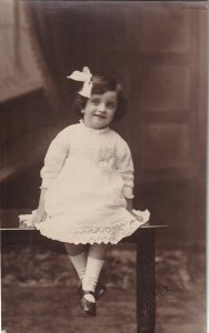RP: Pretty Little Girl sitting pretty ona fence, 1916