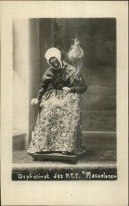 Bizarre Unusual Old Woman Doll Spinning Jacquin ORPHELINAT DES PTT c1910 RPPC