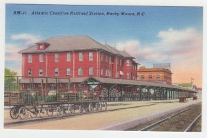 P1992, vintage postcard cargo wagons atlantic coast train station rocky mt NH