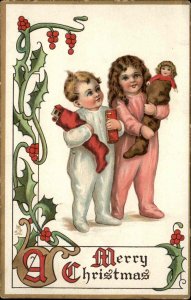 Tuck Christmas Children Little Girl and Boy with Stockings c1910 Postcard