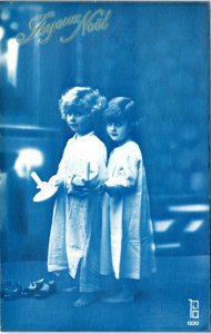 Postcard French Christmas blue tint Children in nightgown with candlestick