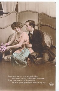 Romance Postcard - Young Man and Young Lady Sat on Settee    XX684