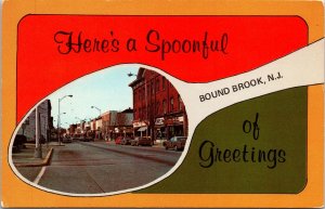 VINTAGE POSTCARD STREET SCENE SPOON SHAPE GREETINGS FROM BOUND BROOK N.J. 1970s