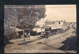 REAL PHOTO REEDLEY CALIFORNIA DOWNTOWN STREET SCENE STORES OSTCARD COPY