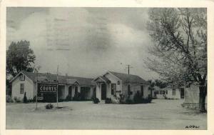 1952 Ellis Down Town Courts Henryetta Oklahoma roadside Kaeser postcard 859