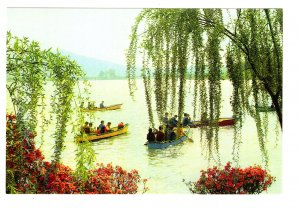 Lake Hsuan Wu, China, People in Small Boats