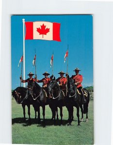 Postcard Royal Canadian Mounted Police and the new flag of Canada