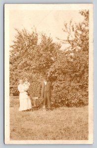 RPPC Man in Top Hat w/Pocket Watch Lady & Child AZO 1918-1930 VTG Postcard 1382
