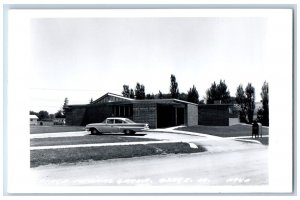 Osage Iowa Postcard RPPC Photo Osage Medical Group Building Car Scene c1950's