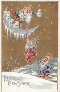 Elves climbing rope money bags moon gold gilt New Year Postcard c1908