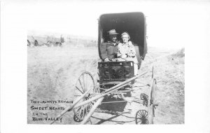 H18/ Blue Valley Montana RPPC Postcard Wagon Couple Love